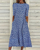 Blommig klänning med fickor